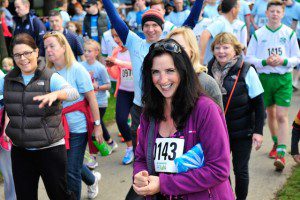 All smiles as the crowd go over the start line. Photograph: Margaret Brown dlr Community 5K, took place on Saturday 11th October 2014 at 2pm in Kilbogget Park, Ballybrack, Co Dublin. For further information contact Dún Laoghaire-Rathdown Sports Partnership Tel. 01-2719502