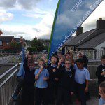 St Annes kids with ice cream standing with flag