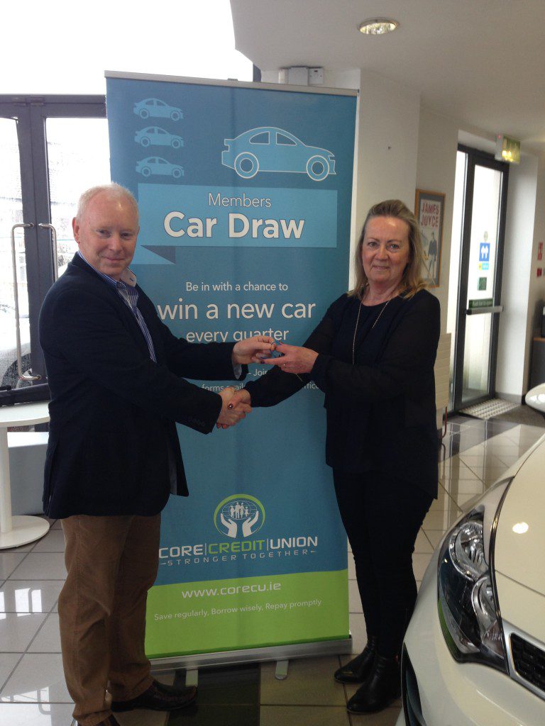 Car Draw Winner with Banner, Car Keys and Chair of Core CU