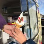 close-up-of-ice-cream-being-handed-over-no-faces