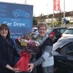 Maura Duffy with Liz Harper Banner and Flowers upclose