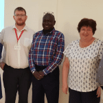 Caption 5. Michael and his fellow volunteers, Bernie, Mary and Gerry, with Foday Sanyang, General Manager, NACCUG, at the start of the workshop.